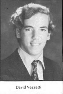 A young man in a suit and tie.