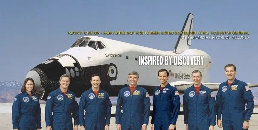 A group of men standing in front of an airplane.