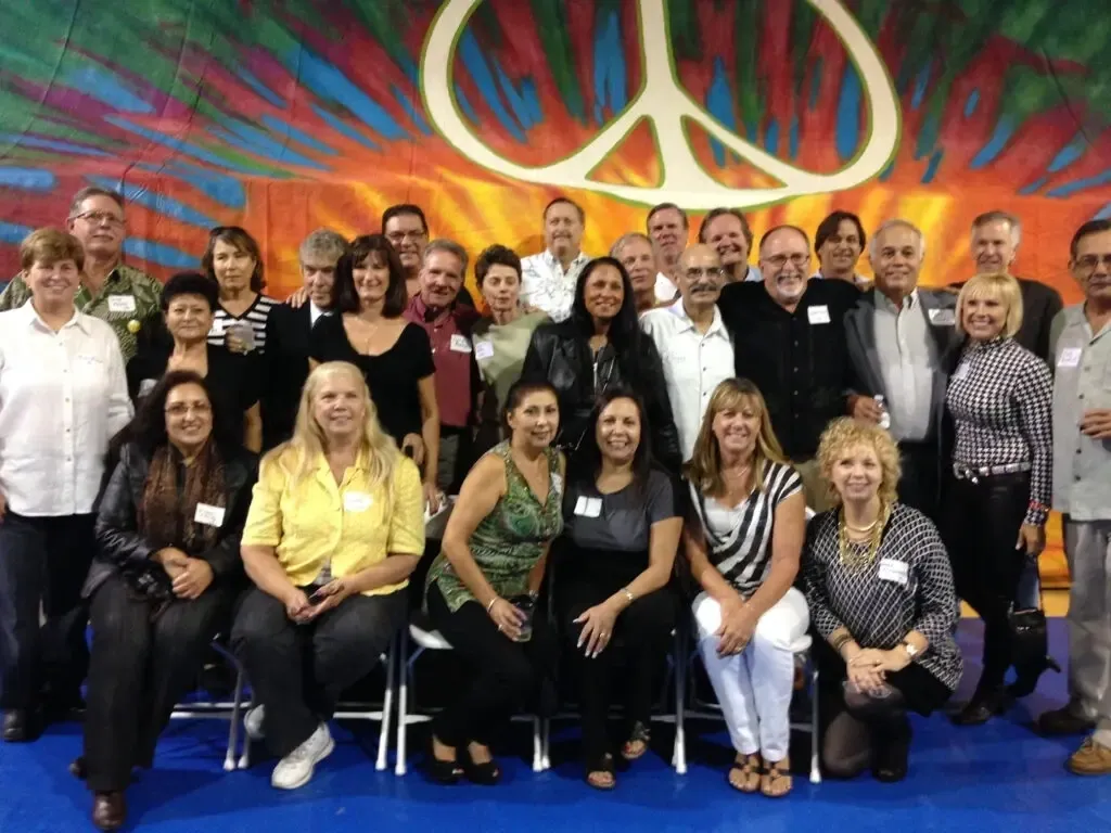 A group of people posing for a picture.