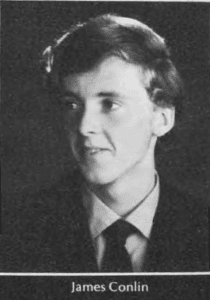 James Conlin Black and white portrait of a young man in formal attire.